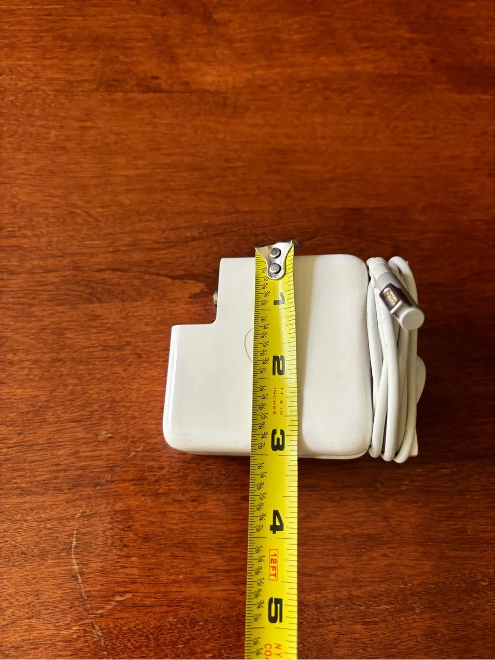 Apple MagSafe power adapter with a fold-out wall plug duckhead attachment